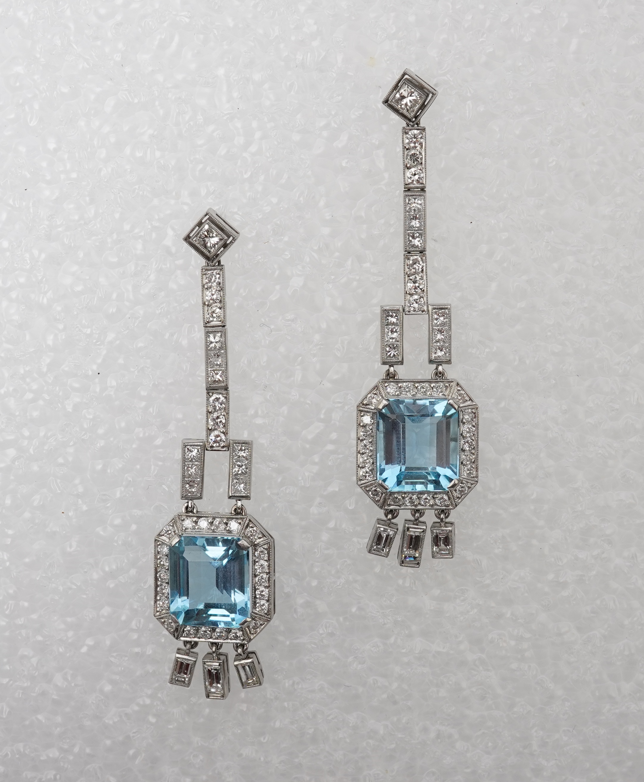 An attractive pair of aquamarine and diamond earrings